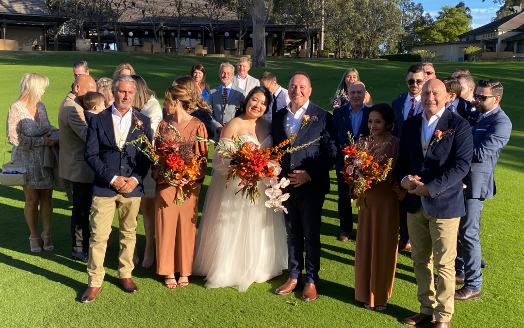 Casual wedding image with family after a ceremony.
